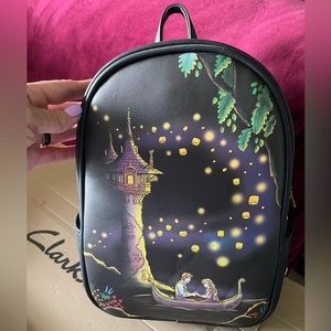 Loungefly rapunzel see the lights glow in the dark backpack